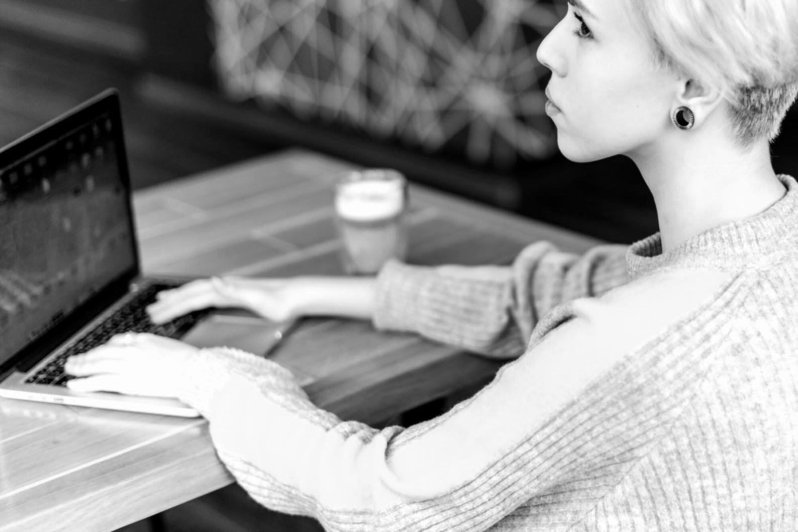 Budget planning session with financial documents and calculator on desk